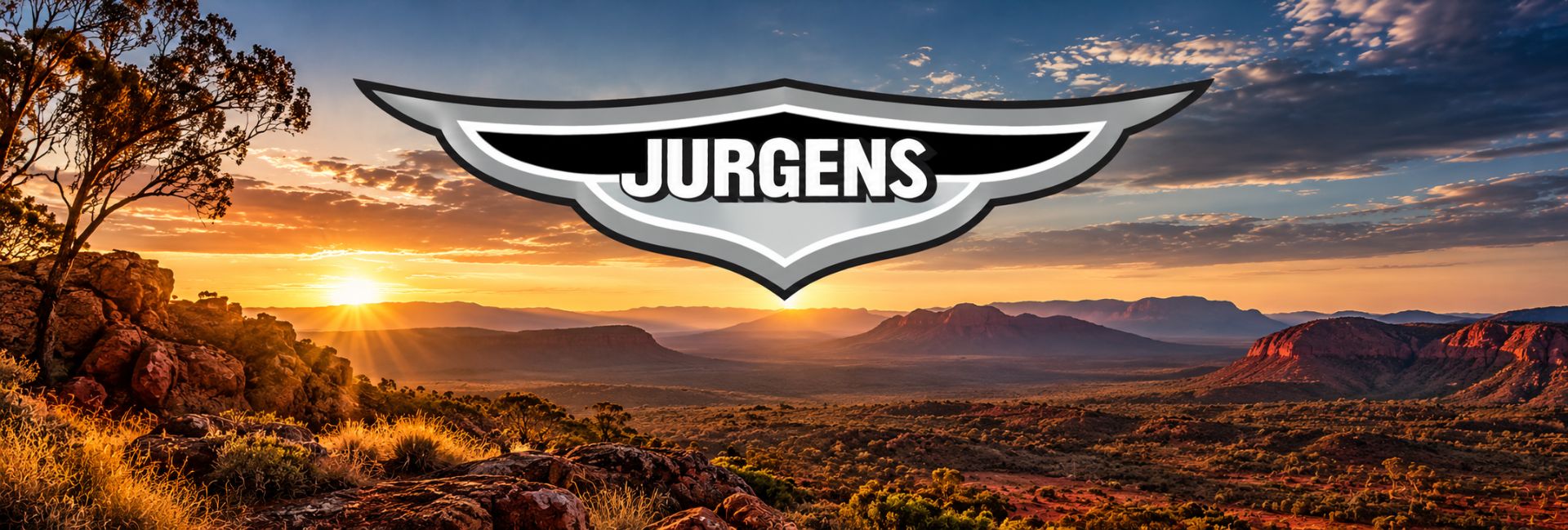 Jurgens logo over an outback sunset at Uluru Jurgens logo over an outback sunset at Uluru